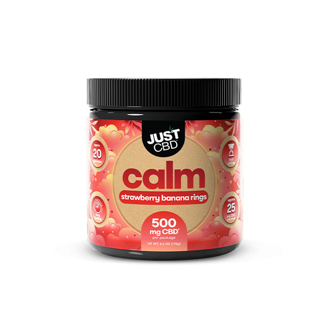 A jar of Just CBD Calm strawberry banana rings, 500 mg CBD, on a white background.